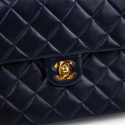 navy blue chanel bag with gold chain